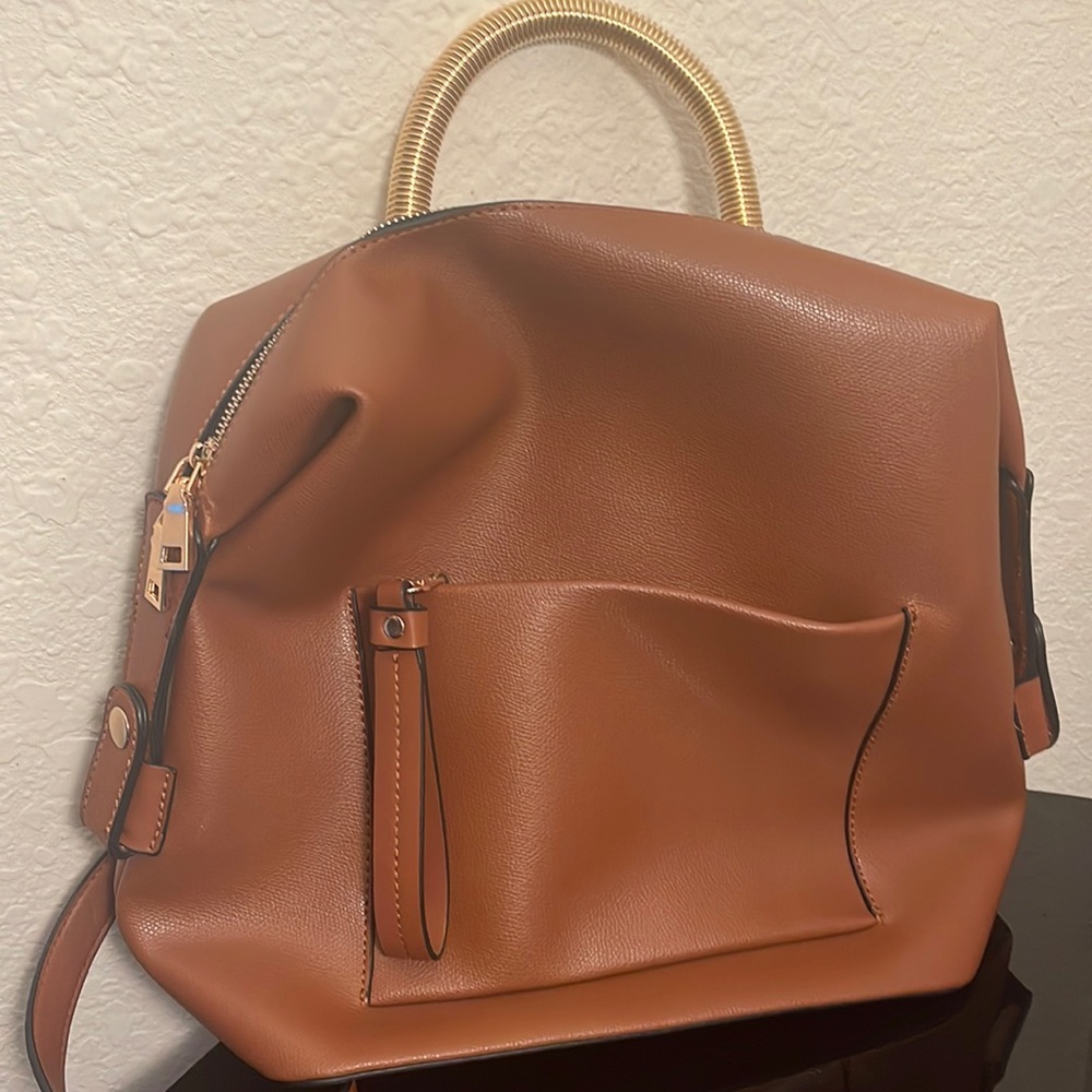 Handheld or backpack leather bag